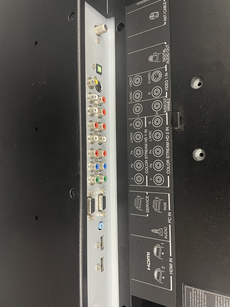 Free flat screen, stand and remote.  (Not a smart tv)