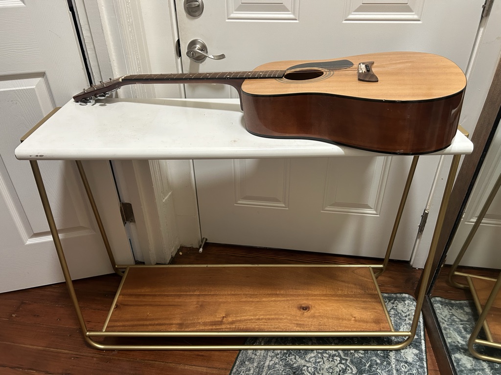Free Tv console + guitar and small plates.