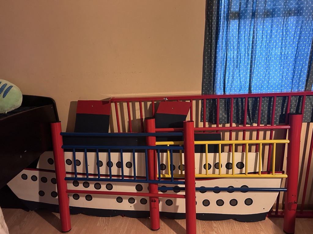 Free Red, blue & yellow unisex twin bed frame( Free) need gone asap if interested, thank you
