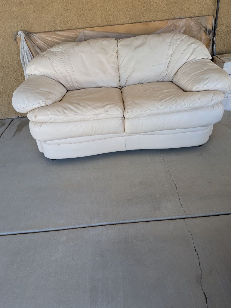 Free White leather sofa