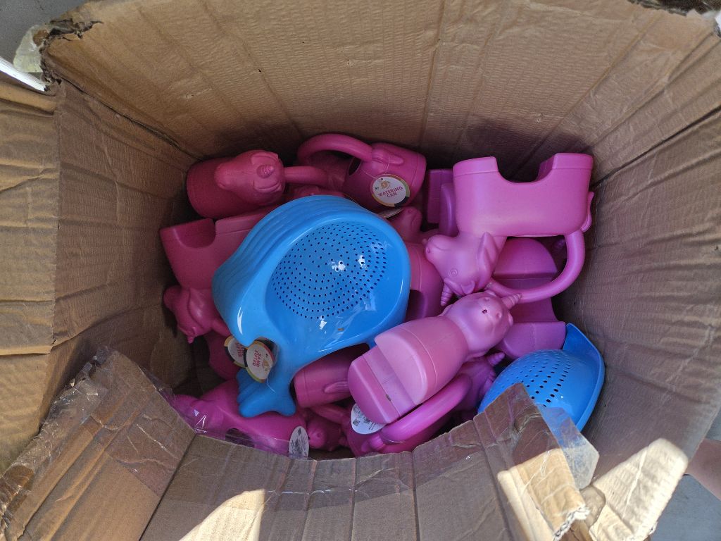 Free sand sifters and water cans