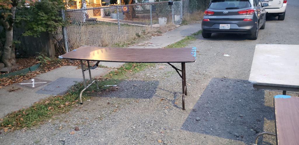 Freed tables please come get befor it Rains I just posted them brown and white one