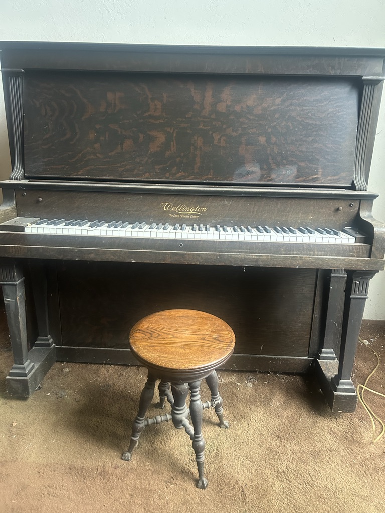 Free 1920 Wellington stand up piano and stool