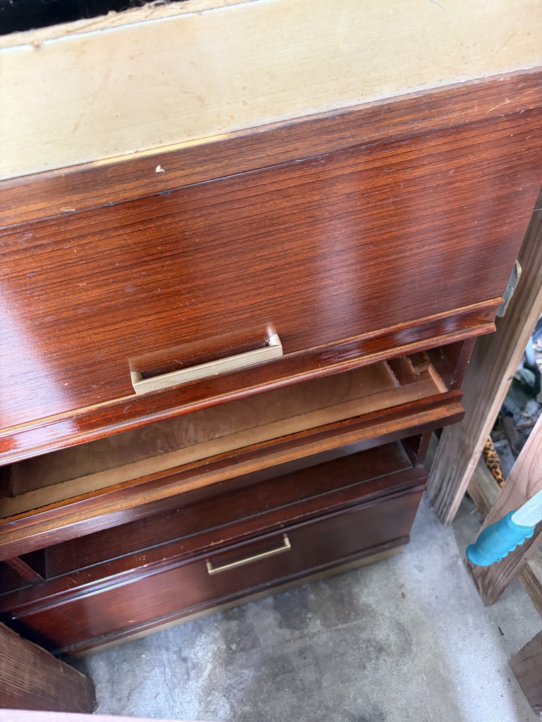 Free Entertainment center 4 pieces smaller entertainment center table and 4 chairs table legs need work free come get it all 1608 ridge dr cocoa