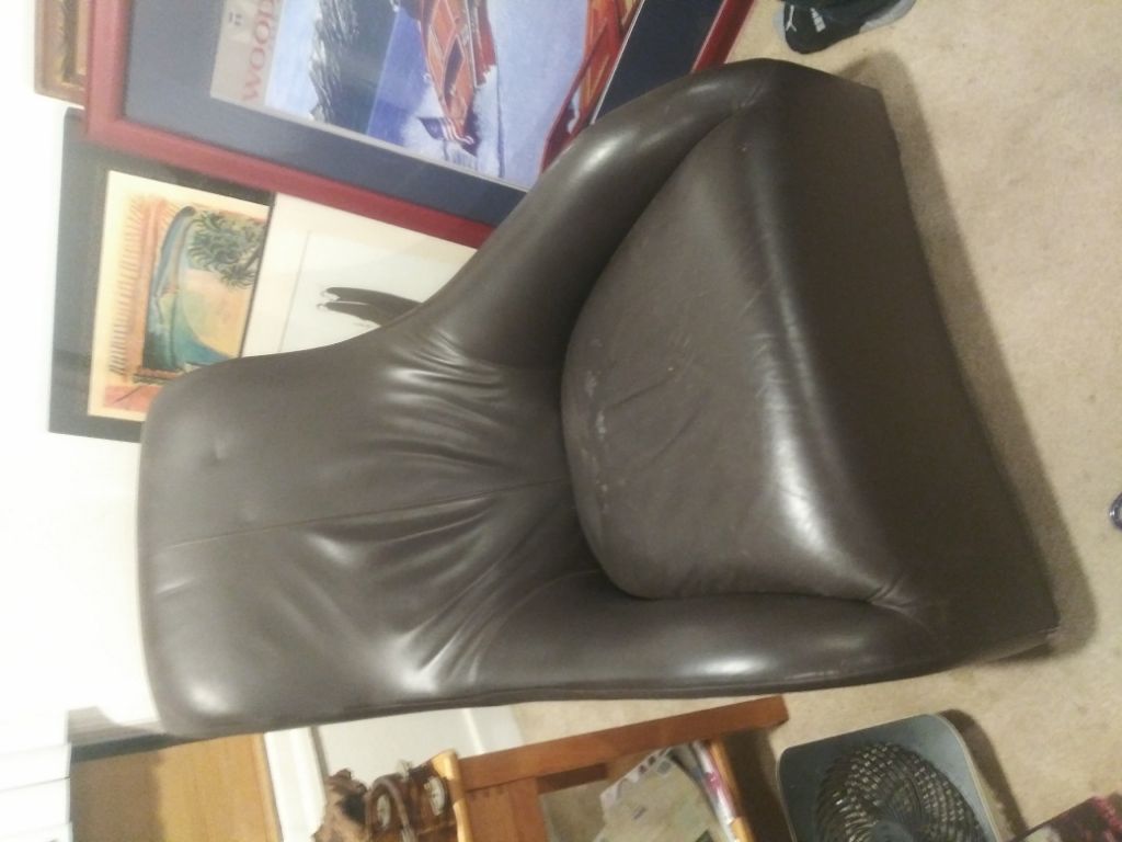 Free Leather chair, sits low and comfortable