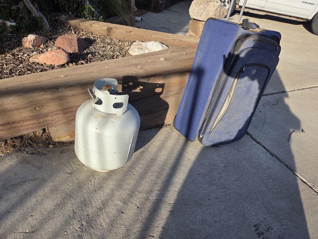 Free Propane Tank very large suitcase