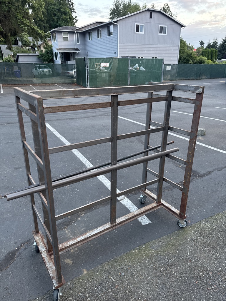 Free Rusty old industrial rolling clothes rack