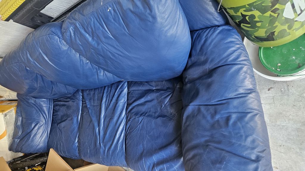 Free Dark blue leather sofa used great condition.