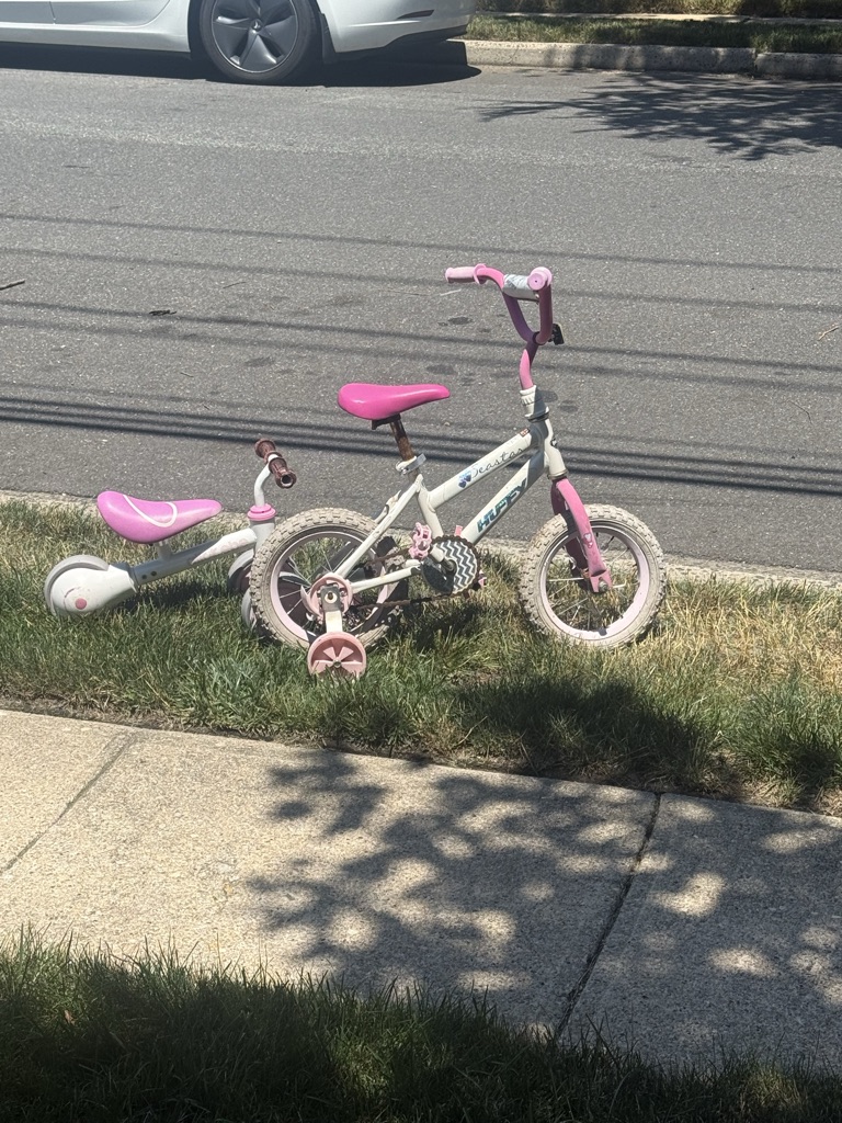 Free Balance bike and little girls bike. At the curb. Maple drive in Roosevelt NY.