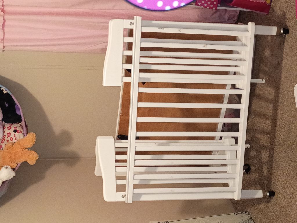 Free White collapsible baby crib portable with mattress