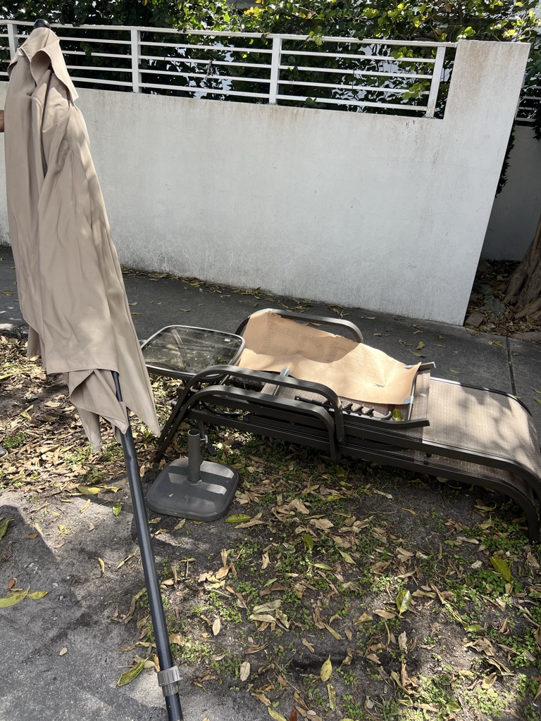 Free Mesh loungers , end table and umbrella with stand base