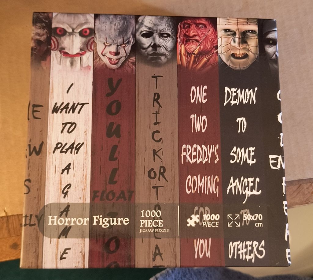 Free - 1000-piece horror movie character collage jigsaw puzzle box.