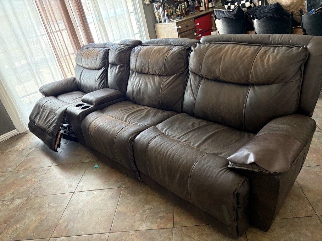 Free leather electric recline coach.
