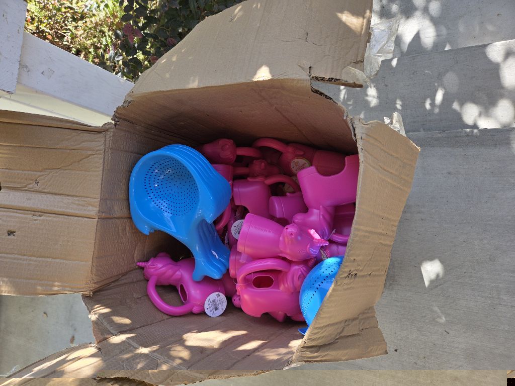 Free unicorn water cans and sand sifters