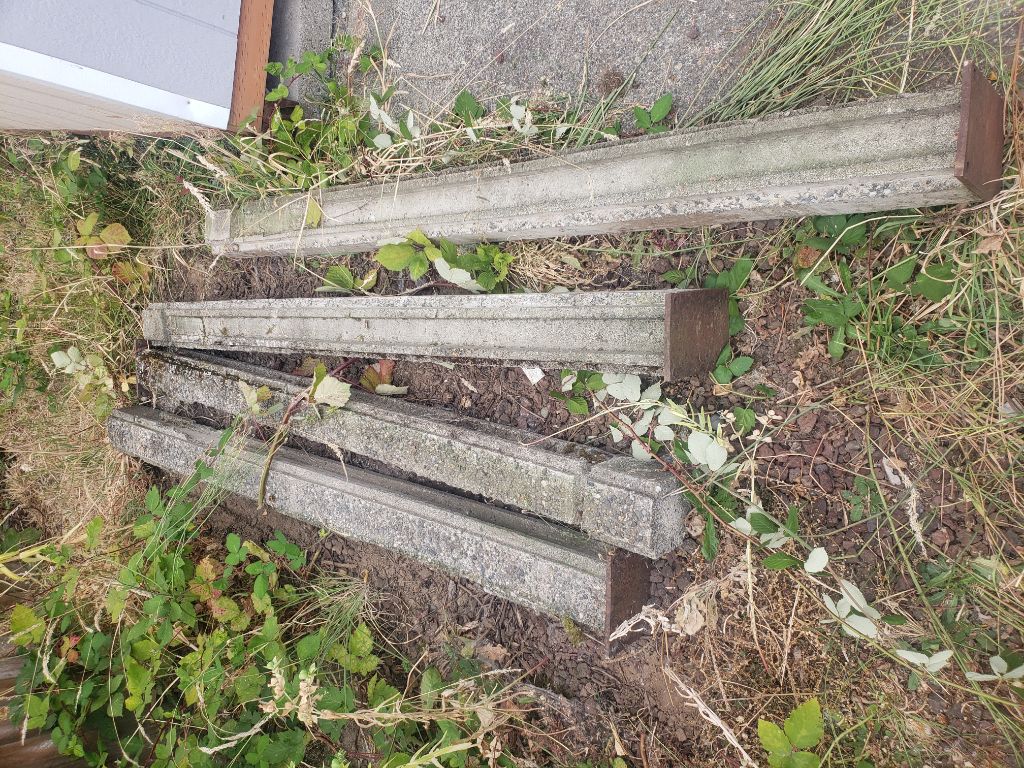Free 4 / 6 ft tall cement posts