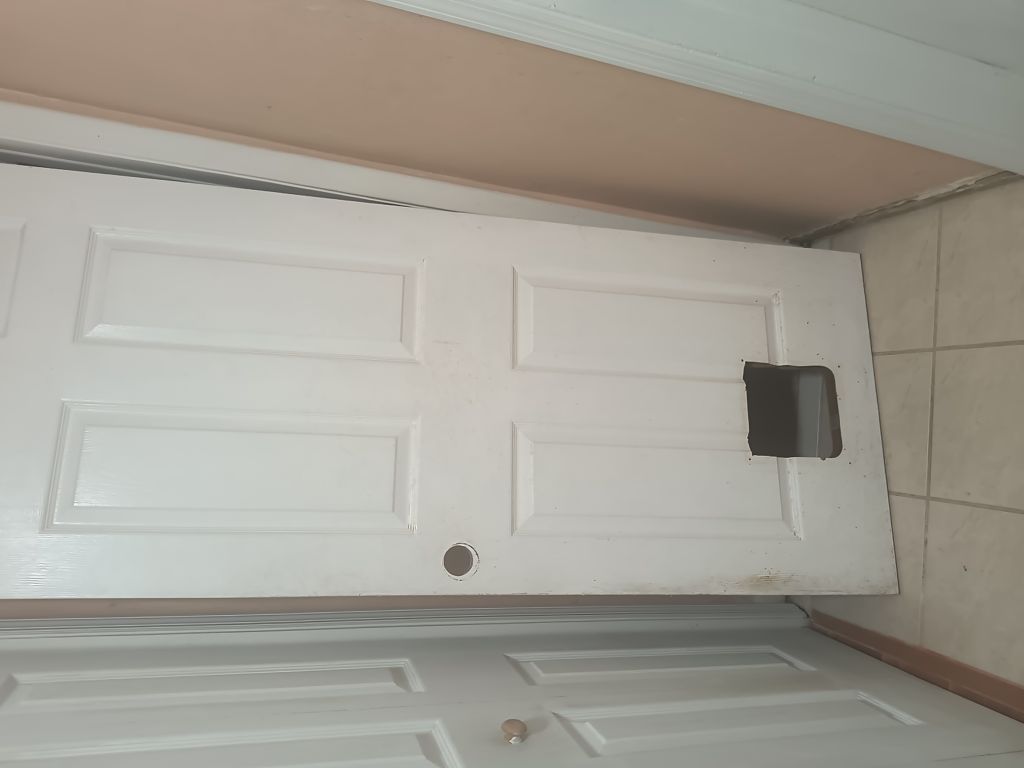 Free Bedroom door with cat or small dog hole